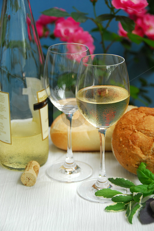 To use this stock image in your creative project, please select the size you need over to the right and click the "Add to Cart" button.
Your downloaded image will come with the Cutcaster watermark removed so don’t worry about the watermark you see on this page. White wine with glasses stock photo, Table setting with chilled white wine and glasses by Elena Elisseeva