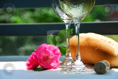 To use this stock image in your creative project, please select the size you need over to the right and click the "Add to Cart" button.
Your downloaded image will come with the Cutcaster watermark removed so don’t worry about the watermark you see on this page. Two wine glasses stock photo, Two wine glasses with white wine, table setting outside by Elena Elisseeva
