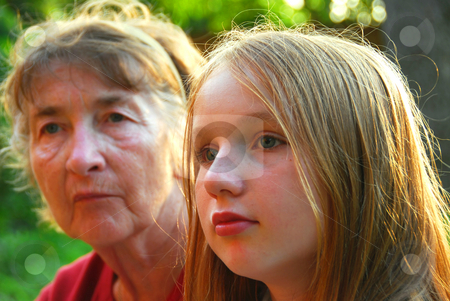 To use this stock image in your creative project, please select the size you need over to the right and click the "Add to Cart" button.
Your downloaded image will come with the Cutcaster watermark removed so don’t worry about the watermark you see on this page. Two women stock photo, Portrait of a grandmother and granddaughter by Elena Elisseeva