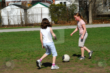 To use this stock image in your creative project, please select the size you need over to the right and click the "Add to Cart" button.
Your downloaded image will come with the Cutcaster watermark removed so don’t worry about the watermark you see on this page. Girls playing soccer stock photo, Young girls playing soccer by Elena Elisseeva