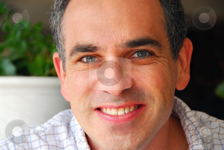 To use this stock image in your creative project, please select the size you need over to the right and click the "Add to Cart" button.
Your downloaded image will come with the Cutcaster watermark removed so don’t worry about the watermark you see on this page. Man portrait stock photo, Portrait of a man in a cafe by Elena Elisseeva