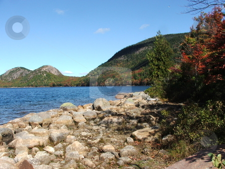 To use this stock image in your creative project, please select the size you need over to the right and click the "Add to Cart" button.
Your downloaded image will come with the Cutcaster watermark removed so don’t worry about the watermark you see on this page. Echo Lake in Acadia National Park stock photo, Echo Lake is nestled in the mountains of Maine's Acadia National Park on Mount Desert Isle. by Dennis Thomsen