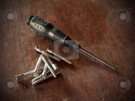 To use this stock image in your creative project, please select the size you need over to the right and click the "Add to Cart" button.
Your downloaded image will come with the Cutcaster watermark removed so don’t worry about the watermark you see on this page. Screwdriver stock photo, Nails and screwdriver on a work table by Adrian Costea