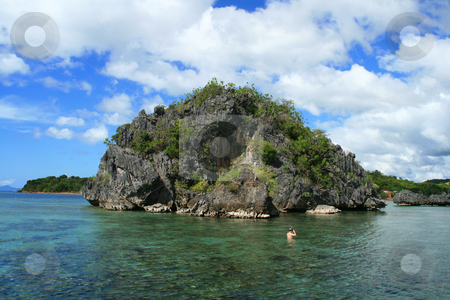 To use this stock image in your creative project, please select the size you need over to the right and click the "Add to Cart" button.
Your downloaded image will come with the Cutcaster watermark removed so don’t worry about the watermark you see on this page. Tropical island 2 stock photo, Scenic view of a tropical island in a lagoon by Jonas Marcos San Luis