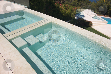 To use this stock image in your creative project, please select the size you need over to the right and click the "Add to Cart" button.
Your downloaded image will come with the Cutcaster watermark removed so don’t worry about the watermark you see on this page. Custom Luxury Pool and Chairs stock photo, Custom Luxury Pool and Chairs Abstract by Andy Dean