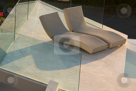 To use this stock image in your creative project, please select the size you need over to the right and click the "Add to Cart" button.
Your downloaded image will come with the Cutcaster watermark removed so don’t worry about the watermark you see on this page. Custom Luxury Pool and Chairs stock photo, Custom Luxury Pool and Chairs Abstract by Andy Dean