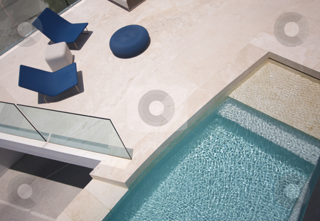To use this stock image in your creative project, please select the size you need over to the right and click the "Add to Cart" button.
Your downloaded image will come with the Cutcaster watermark removed so don’t worry about the watermark you see on this page. Custom Luxury Pool and Chairs stock photo, Custom Luxury Pool and Chairs Abstract by Andy Dean