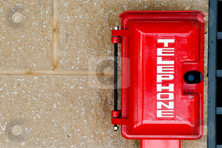 To use this stock image in your creative project, please select the size you need over to the right and click the "Add to Cart" button.
Your downloaded image will come with the Cutcaster watermark removed so don’t worry about the watermark you see on this page. Emergency Phone stock photo, An emergency phone in a call box. by Robert Byron