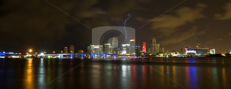 To use this stock image in your creative project, please select the size you need over to the right and click the "Add to Cart" button.
Your downloaded image will come with the Cutcaster watermark removed so don’t worry about the watermark you see on this page. LIghtning Strikes Downtown Miami Skyline at Night stock photo, Lightning striking a building in the Miami Skyline at Night by Justin Rosenberg