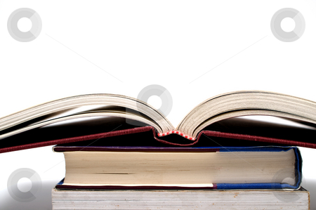 To use this stock image in your creative project, please select the size you need over to the right and click the "Add to Cart" button.
Your downloaded image will come with the Cutcaster watermark removed so don’t worry about the watermark you see on this page. Books stock photo, A stack of books ready to be studied. by Robert Byron