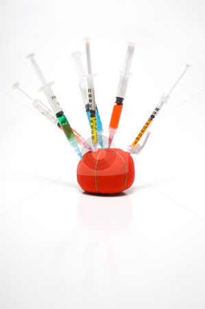 To use this stock image in your creative project, please select the size you need over to the right and click the "Add to Cart" button.
Your downloaded image will come with the Cutcaster watermark removed so don’t worry about the watermark you see on this page. Syringe Pin Cushion stock photo, A batch of medical syringes in a pin cushion. by Robert Byron