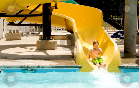 To use this stock image in your creative project, please select the size you need over to the right and click the "Add to Cart" button.
Your downloaded image will come with the Cutcaster watermark removed so don’t worry about the watermark you see on this page. Boy on a Waterslide stock photo, A young boy sliding down a water slide. by Robert Byron