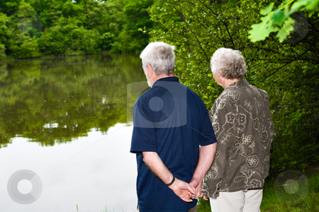 To use this stock image in your creative project, please select the size you need over to the right and click the "Add to Cart" button.
Your downloaded image will come with the Cutcaster watermark removed so don’t worry about the watermark you see on this page. Grandparents watching the lake stock photo, Outside portrait of an elderly couple standing near a lake by Frenk and Danielle Kaufmann