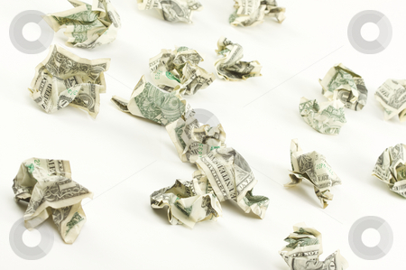 To use this stock image in your creative project, please select the size you need over to the right and click the "Add to Cart" button.
Your downloaded image will come with the Cutcaster watermark removed so don’t worry about the watermark you see on this page. Crumpled Dollars stock photo, Crumpled Dollars on a White Background. by Andy Dean