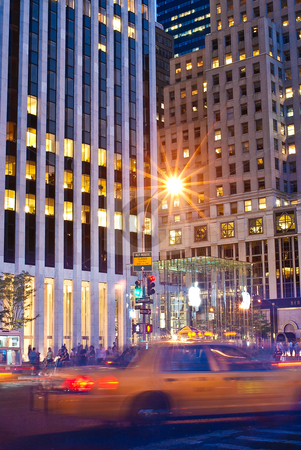 To use this stock image in your creative project, please select the size you need over to the right and click the "Add to Cart" button.
Your downloaded image will come with the Cutcaster watermark removed so don’t worry about the watermark you see on this page. New York Rush stock photo, Dusk at the busy intersection of 59th Street by Michael Huitt