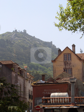 To use this stock image in your creative project, please select the size you need over to the right and click the "Add to Cart" button.
Your downloaded image will come with the Cutcaster watermark removed so don’t worry about the watermark you see on this page. Sintra Portugal stock photo, Looking up a street in the village of Sintra, toward a castle on a hill. by Jessica Tooley