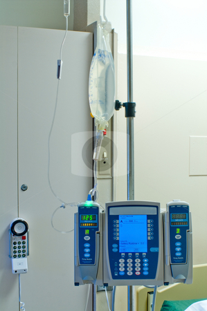To use this stock image in your creative project, please select the size you need over to the right and click the "Add to Cart" button.
Your downloaded image will come with the Cutcaster watermark removed so don’t worry about the watermark you see on this page. IV Pump stock photo, An automatic IV pump in a hospital. by Robert Byron