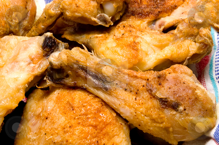 To use this stock image in your creative project, please select the size you need over to the right and click the "Add to Cart" button.
Your downloaded image will come with the Cutcaster watermark removed so don’t worry about the watermark you see on this page. Southern Fried Chicken stock photo, A pile of delicious southern fried chicken. by Robert Byron