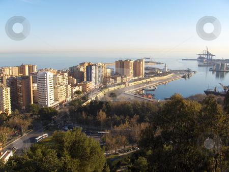 To use this stock image in your creative project, please select the size you need over to the right and click the "Add to Cart" button.
Your downloaded image will come with the Cutcaster watermark removed so don’t worry about the watermark you see on this page. Malaga Spain stock photo, Looking down on the industrial harbour and resort high rises of Malaga, Spain. by Jessica Tooley