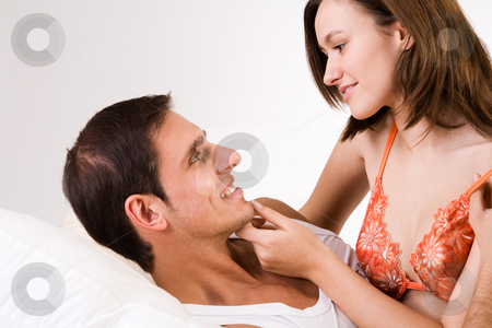To use this stock image in your creative project, please select the size you need over to the right and click the "Add to Cart" button.
Your downloaded image will come with the Cutcaster watermark removed so don’t worry about the watermark you see on this page. Sweet chin of him stock photo, Young adult couple in the studio hugging by Frenk and Danielle Kaufmann
