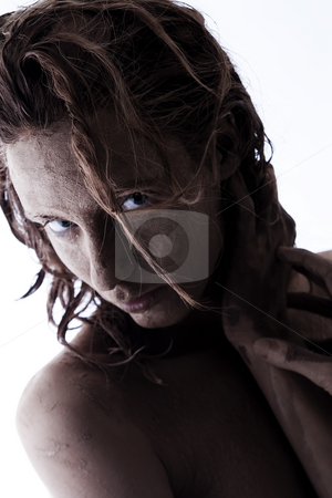 To use this stock image in your creative project, please select the size you need over to the right and click the "Add to Cart" button.
Your downloaded image will come with the Cutcaster watermark removed so don’t worry about the watermark you see on this page. Clay shot stock photo, A model totally covered in clay by Frenk and Danielle Kaufmann