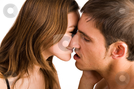 To use this stock image in your creative project, please select the size you need over to the right and click the "Add to Cart" button.
Your downloaded image will come with the Cutcaster watermark removed so don’t worry about the watermark you see on this page. Kiss the boy stock photo, Young adult couple in the studio kissing by Frenk and Danielle Kaufmann