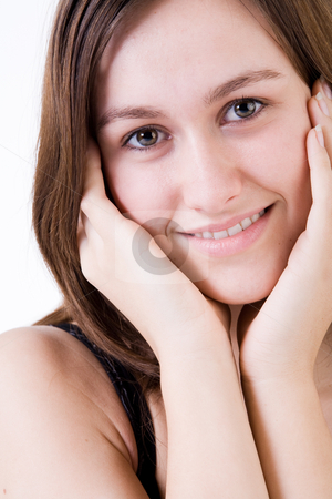 To use this stock image in your creative project, please select the size you need over to the right and click the "Add to Cart" button.
Your downloaded image will come with the Cutcaster watermark removed so don’t worry about the watermark you see on this page. Sweet woman smiling stock photo, Young woman portrait in the studio on a white background by Frenk and Danielle Kaufmann