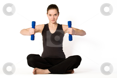 To use this stock image in your creative project, please select the size you need over to the right and click the "Add to Cart" button.
Your downloaded image will come with the Cutcaster watermark removed so don’t worry about the watermark you see on this page. Young girl is concentrating on weights stock photo, Young girl is sporting in the studio on a white background by Frenk and Danielle Kaufmann
