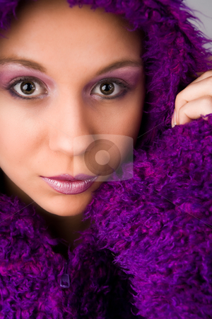 To use this stock image in your creative project, please select the size you need over to the right and click the "Add to Cart" button.
Your downloaded image will come with the Cutcaster watermark removed so don’t worry about the watermark you see on this page. Woman wearing purple fur coat stock photo, Young woman with a hypnotizing look by Frenk and Danielle Kaufmann