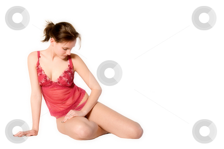 To use this stock image in your creative project, please select the size you need over to the right and click the "Add to Cart" button.
Your downloaded image will come with the Cutcaster watermark removed so don’t worry about the watermark you see on this page. Woman in red lingerie looking down stock photo, Studio portrait of a young woman in red lingerie by Frenk and Danielle Kaufmann
