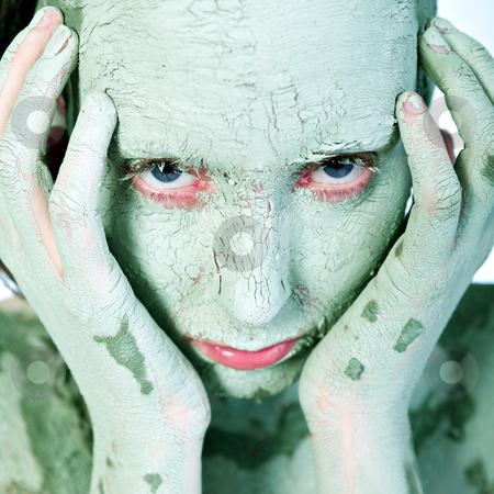 To use this stock image in your creative project, please select the size you need over to the right and click the "Add to Cart" button.
Your downloaded image will come with the Cutcaster watermark removed so don’t worry about the watermark you see on this page. Face covered in green clay stock photo, Nude woman model wearing a clay mask by Frenk and Danielle Kaufmann