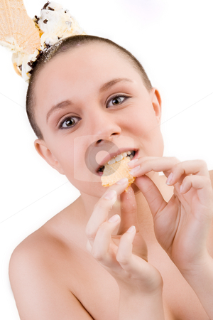 To use this stock image in your creative project, please select the size you need over to the right and click the "Add to Cart" button.
Your downloaded image will come with the Cutcaster watermark removed so don’t worry about the watermark you see on this page. Eating my bisquit stock photo, Young goodlooking woman with a ice cream on her head by Frenk and Danielle Kaufmann