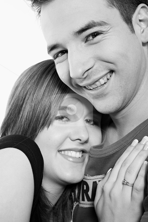 To use this stock image in your creative project, please select the size you need over to the right and click the "Add to Cart" button.
Your downloaded image will come with the Cutcaster watermark removed so don’t worry about the watermark you see on this page. Portrait of girfriendl and boyfriend stock photo, Portrait of two lovers in the studio by Frenk and Danielle Kaufmann