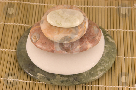 To use this stock image in your creative project, please select the size you need over to the right and click the "Add to Cart" button.
Your downloaded image will come with the Cutcaster watermark removed so don’t worry about the watermark you see on this page. Four Massage Stones stock photo, Four Massage Stone Stack by Ariana Bauer