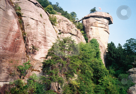 To use this stock image in your creative project, please select the size you need over to the right and click the "Add to Cart" button.
Your downloaded image will come with the Cutcaster watermark removed so don’t worry about the watermark you see on this page. Chimney Rock stock photo, View of Chimney Rock from the ground. This is a natural rock formation by Marburg