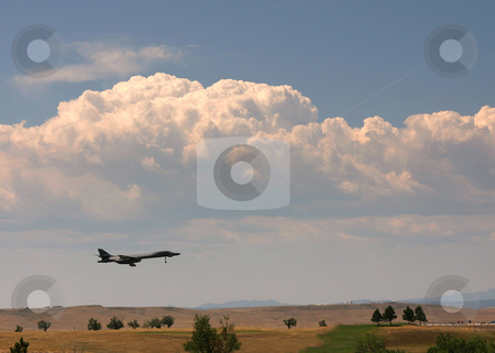 To use this stock image in your creative project, please select the size you need over to the right and click the "Add to Cart" button.
Your downloaded image will come with the Cutcaster watermark removed so don’t worry about the watermark you see on this page. B-1 Bomber on Approach stock photo, A B-1B bomber approaches Ellsworth AFB, Rapid City, SD. by Marc Saegesser