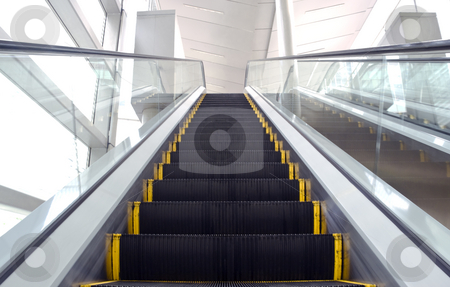 To use this stock image in your creative project, please select the size you need over to the right and click the "Add to Cart" button.
Your downloaded image will come with the Cutcaster watermark removed so don’t worry about the watermark you see on this page. Escalator stock photo, An image of an escalator with some motion blur by Stefan Breton