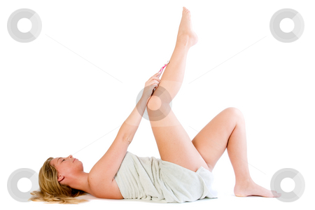 To use this stock image in your creative project, please select the size you need over to the right and click the "Add to Cart" button.
Your downloaded image will come with the Cutcaster watermark removed so don’t worry about the watermark you see on this page. Wellness girl series shaving stock photo, Studio portrait of a spa girl shaving her leg by Frenk and Danielle Kaufmann