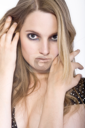 To use this stock image in your creative project, please select the size you need over to the right and click the "Add to Cart" button.
Your downloaded image will come with the Cutcaster watermark removed so don’t worry about the watermark you see on this page. Woman playing with hair stock photo, Studioportrait of a long haired girl by Frenk and Danielle Kaufmann