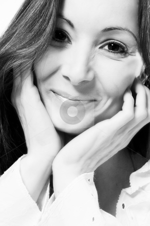 To use this stock image in your creative project, please select the size you need over to the right and click the "Add to Cart" button.
Your downloaded image will come with the Cutcaster watermark removed so don’t worry about the watermark you see on this page. Smiling duo-tone stock photo, Portrait of a woman in front of a white background in a studio enviroment by Frenk and Danielle Kaufmann