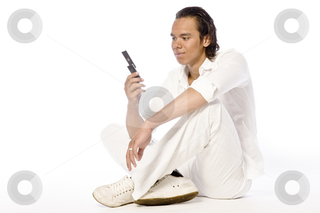 To use this stock image in your creative project, please select the size you need over to the right and click the "Add to Cart" button.
Your downloaded image will come with the Cutcaster watermark removed so don’t worry about the watermark you see on this page. Asian sexy looking boy looking at his mobile stock photo, Studio portrait of a muscular Asian sexy looking boy looking at his mobile by Frenk and Danielle Kaufmann