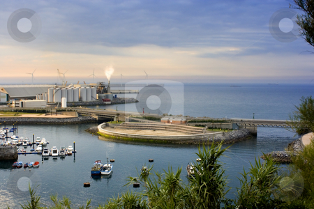 To use this stock image in your creative project, please select the size you need over to the right and click the "Add to Cart" button.
Your downloaded image will come with the Cutcaster watermark removed so don’t worry about the watermark you see on this page. Industry stock photo, Image of a industry near the dock in the sea by Ivan Montero