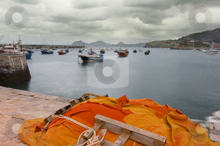 To use this stock image in your creative project, please select the size you need over to the right and click the "Add to Cart" button.
Your downloaded image will come with the Cutcaster watermark removed so don’t worry about the watermark you see on this page. Port stock photo, Boats in the harbour near the city by Ivan Montero