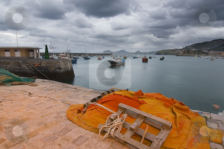 To use this stock image in your creative project, please select the size you need over to the right and click the "Add to Cart" button.
Your downloaded image will come with the Cutcaster watermark removed so don’t worry about the watermark you see on this page. Port stock photo, Boats in the harbour near the city by Ivan Montero