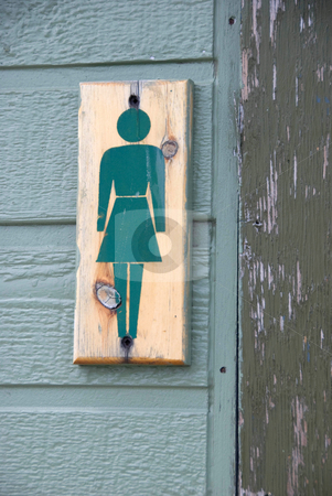 To use this stock image in your creative project, please select the size you need over to the right and click the "Add to Cart" button.
Your downloaded image will come with the Cutcaster watermark removed so don’t worry about the watermark you see on this page. Ladies Washroom stock photo, Stock photo of a wooden sign with a green symbol of a woman on the outside of a ladie's washroom by Maria Bell