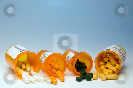 To use this stock image in your creative project, please select the size you need over to the right and click the "Add to Cart" button.
Your downloaded image will come with the Cutcaster watermark removed so don’t worry about the watermark you see on this page. Prescription Medication stock photo, Prescription pills in a plastic medicine bottle. by Robert Byron