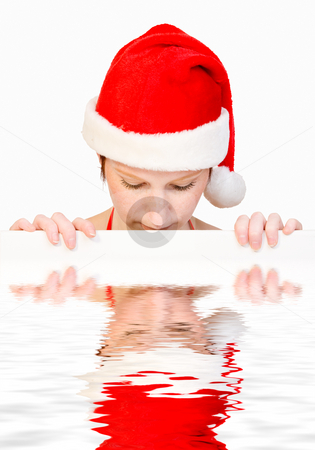 To use this stock image in your creative project, please select the size you need over to the right and click the "Add to Cart" button.
Your downloaded image will come with the Cutcaster watermark removed so don’t worry about the watermark you see on this page. Santa girl with whiteboard stock photo, Beautiful girl in christmas bikini and with christmas hat is holding up a white sign for copy space. With background clipping path for your convenience by Frenk and Danielle Kaufmann
