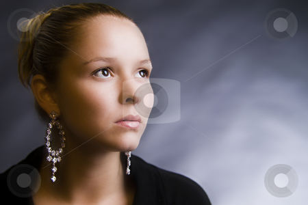 To use this stock image in your creative project, please select the size you need over to the right and click the "Add to Cart" button.
Your downloaded image will come with the Cutcaster watermark removed so don’t worry about the watermark you see on this page. Looking there stock photo, Model looking forward by Frenk and Danielle Kaufmann