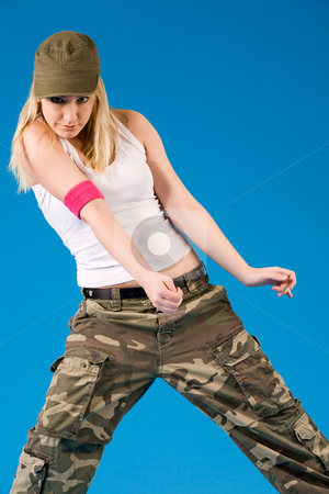 To use this stock image in your creative project, please select the size you need over to the right and click the "Add to Cart" button.
Your downloaded image will come with the Cutcaster watermark removed so don’t worry about the watermark you see on this page. Sexy blond girl dancing stock photo, Attractive blond girl is dancing on a blue background by Frenk and Danielle Kaufmann