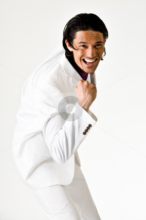 To use this stock image in your creative project, please select the size you need over to the right and click the "Add to Cart" button.
Your downloaded image will come with the Cutcaster watermark removed so don’t worry about the watermark you see on this page. Sexy boy is happy stock photo, Young indonesian man in a business suit by Frenk and Danielle Kaufmann